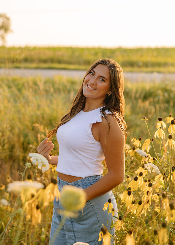Senior photo in flower field