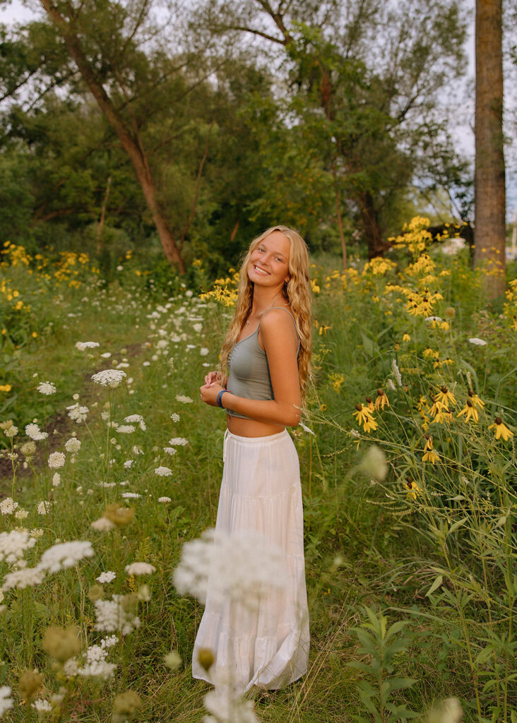 Senior photo in flower field